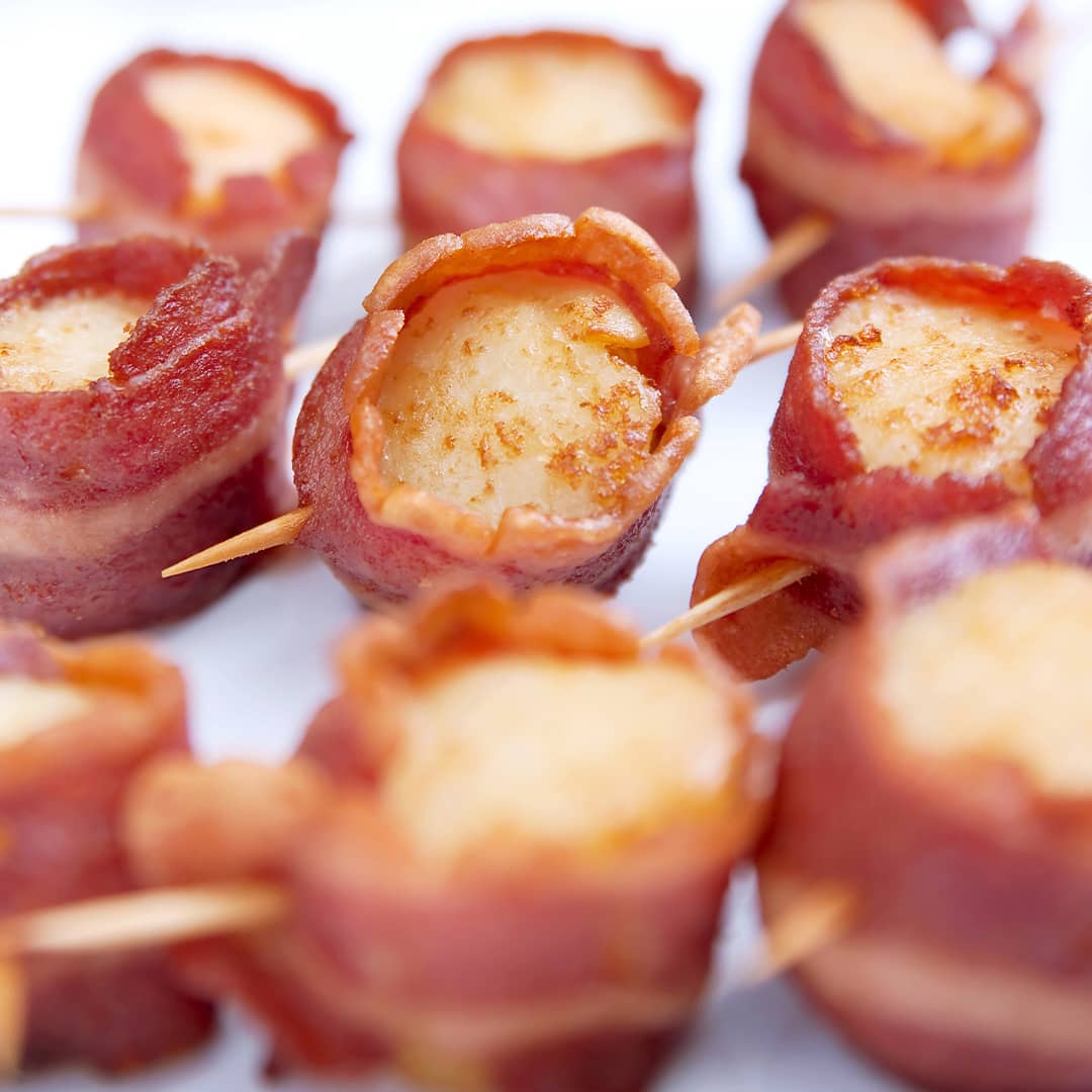 Vieiras envueltas en tocineta